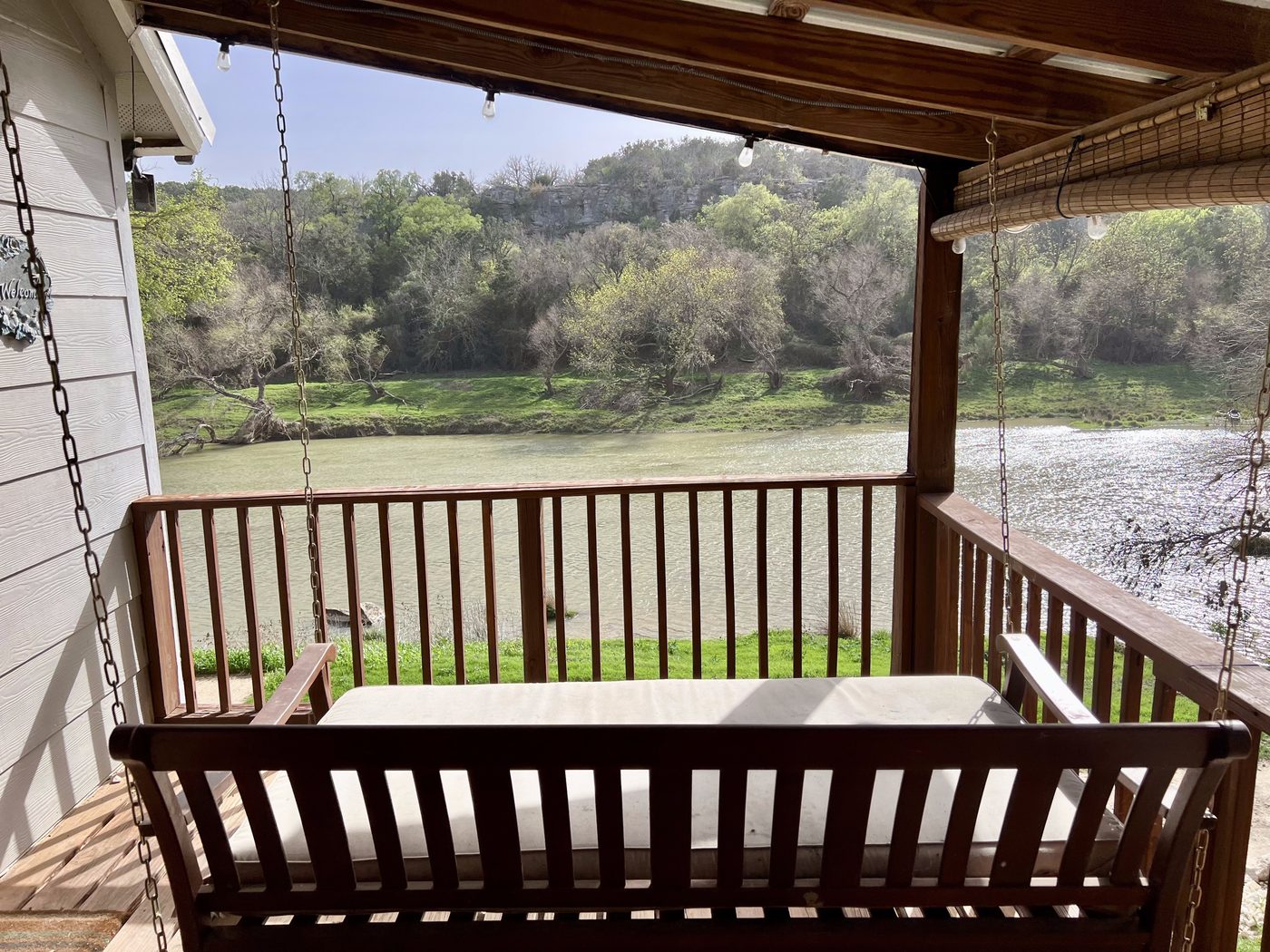 Porch swing overlooking the Colorado River from the cottage deck